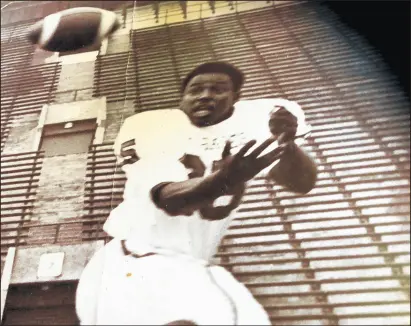  ?? PHOTOS PROVIDED BY CYNTHIA FLORENCE-PATTON ?? Byron “Duke” Florence catches a football at Northern Illinois.