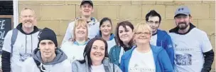  ??  ?? Accrington Springhill Care Home workers took to the streets to raise money for children currently living in extreme poverty in Africa.