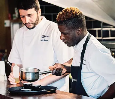  ??  ?? ‘Like family’: Restaurate­ur Nico Simeone, left, with his protégé Modou Diagne