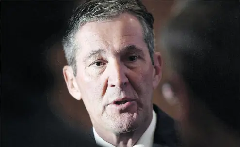  ?? JUSTIN TANG / THE CANADIAN PRESS FILES ?? Manitoba Premier Brian Pallister has left the door open to joining Saskatchew­an and Ontario in legal action against the federal carbon tax plans. “The federal government isn’t giving.” Pallister said. “We gotta fight.”