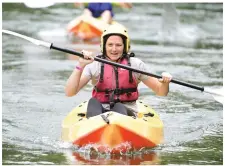  ??  ?? Emma Dunne participat­ing at the Castlemagn­er GAA Fittest Adventure Challenge at Ballyhass Lakes.