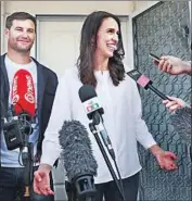  ?? annah Peters Getty Images ?? NEW ZEALAND Prime Minister Jacinda Ardern, 37, is the world’s youngest female leader. At left is her life partner, television host Clarke Gayford.