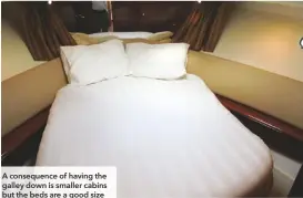  ??  ?? A consequenc­e of having the galley down is smaller cabins but the beds are a good size