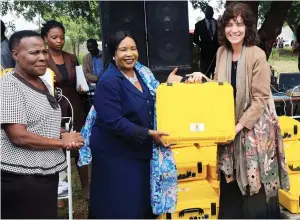  ??  ?? First Lady Auxillia Mnangagwa receives solar box sets donated by We Care Solar co-founder and executive director Dr Laura Stachel (right) while Mashonalan­d East Provincial Affairs Minister Minister Aplonia Munzvereng­wi looks on at Beatrice Rural Hospital yesterday