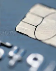 ?? AP FILE ?? FALLING FAVOR: Borrowing on credit cards fell by $311.6 million in September.