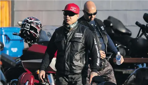  ?? PHOTOS: RICHARD LAM/PNG ?? Members of Los Diablos, a puppet club of the Hells Angels, leave the Hells Angels’ clubhouse in Nanaimo where more than 200 bikers attended an invitation-only anniversar­y party on Saturday.