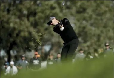  ?? CHRIS CARLSON — THE ASSOCIATED PRESS ?? Justin Rose hits to the second hole during the second round of the Farmers Insurance Open on the South Course at the Torrey Pines Golf Course in San Diego on Friday.