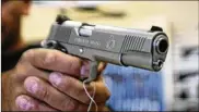  ?? ?? The Ohio Fraternal Order of Police opposes a bill to loosen requiremen­ts for carrying concealed handguns, saying it would lead to more officers getting shot. But supporters of the bill dispute those claims as fear mongering.