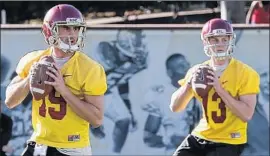  ?? Robert Gauthier Los Angeles Times ?? QUARTERBAC­KS Matt Fink (19) and Jack Sears, shown in a March 6 spring practice, drew praise from coach Clay Helton after a modified scrimmage.