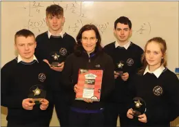  ?? Photo by Eamonn Keogh ?? Scoil Phobail Sliabh Luachra Rathmore Higher Level Maths teacher Catherine Kiely with students Kieran Dalton, Cathal Collins, Diarmaid Nagle and Shauna Davies who finished second in the IT Tralee hosted quiz.
