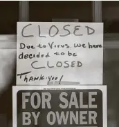  ?? Paul Sancya / Associated Press ?? The impact the pandemic has had on small businesses is seen in this photo taken in April in Grosse Pointe, Mich.