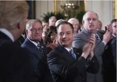  ?? JABIN BOTSFORD/THE WASHINGTON POST ?? Former White House chief of staff Reince Priebus, centre, apparently “resigned privately” on Thursday.