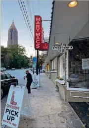  ?? COM LIGAYA FIGUERAS / LIGAYA.FIGUERAS@AJC. ?? Mary Mac’s Tea Room re-opened Nov. 2 for takeout after having been closed for seven months due to the pandemic. The iconic Midtown restaurant will open for dine-in service Nov. 9.