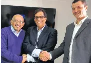  ?? Picture: COURTNEY AFRICA ?? MOVING UP: Aziz Hartley, Dr Iqbal Survé and Carlo Petersen announcing Hartley as Sunday Argus editor and Petersen as Cape Times senior editor.