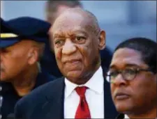  ?? MATT SLOCUM — THE ASSOCIATED PRESS FILE ?? FILe - In this file photo, Bill Cosby, center, leaves the the Montgomery County Courthouse in Norristown, Pa.