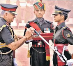  ?? HT PHOTO ?? Cadet Preeti Choudhary from Panipat receiving the coveted Sword of Honour during the passingout parade at Officers Training Academy in Chennai on Saturday. Another cadet from Haryana, Vreeti, was awarded the silver medal. Among other Lady Cadets who...