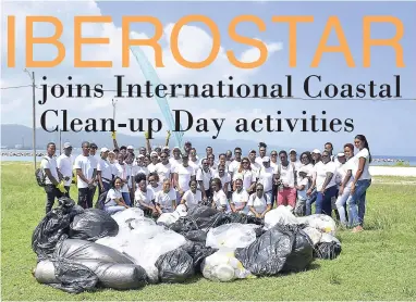  ??  ?? Members of the Iberostar Beach Hotel team pose with their bags of plastic refuse after helping to clean the Dump Up Beach Park in Montego Bay last Saturday.