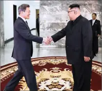  ?? PICTURE: SOUTH KOREA PRESIDENTI­AL BLUE HOUSE/YONHAP/AP ?? North Korean leader Kim Jong-un, right, and South Korean President Moon Jae-in greet before their meeting at the northern side of Panmunjom in North Korea on Saturday. Kim and Moon met for the second time in a month, exchanging broad smiles in a...