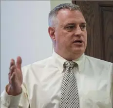  ?? Lake Fong/Post-Gazette ?? Jim Kelly, deputy director of environmen­tal health at the Allegheny County Health Department, speaks Wednesday about improving air quality to health board members and local residents at an Allegheny County Board of Health meeting.