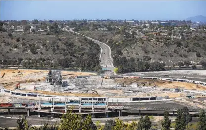  ?? K.C. ALFRED U-T PHOTOS ?? Section 22, above the west tunnel, is the last upper section to be demolished Monday at the Mission Valley stadium.