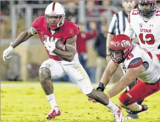  ??  ?? ASSOCIATED PRESS Stanford wide receiver Ty Montgomery escapes a tackle in a game against Utah in November.