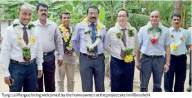  ??  ?? Tung-lai Margue being welcomed by the homeowners at the project site in Kilinochch­i