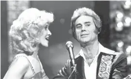  ?? THE ASSOCIATED PRESS ?? Tammy Wynette and George Jones had a tumultuous marriage for six years and recorded several songs together. Jones survived long battles with drug and alcohol addiction.