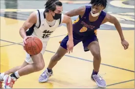  ?? James Franco / Special to the Times Union ?? Shen guard Mason Courtney dribbles up court in front of Troy guard Nasir Dawud-soto during the Suburban Council Tournament title game.