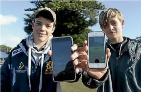  ?? ALASTAIR LYNN/ FAIRFAX NZ ?? Mitchel Ter-Weijden and Caleb Forsyth were lured to Mission Bay in the hope of catching good Pokemon.