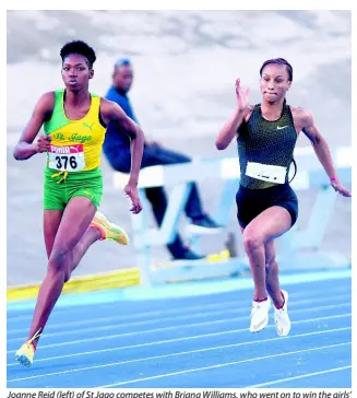  ?? RICARDO MAKYN/CHIEF PHOTO EDITOR ?? Joanne Reid (left) of St Jago competes with Briana Williams, who went on to win the girls’ Under-20 200m final at the Carifta Trials at the National Stadium recently. Williams won with a time of 23.26 seconds.
