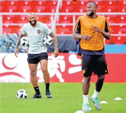  ?? FOTOS: REUTERS Y AFP ?? Thierry Henry, en un entrenamie­nto de Bélgica junto a Romelu Lukaku