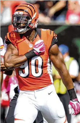  ?? DAVID JABLONSKI / STAFF 2015 ?? “That’s what is great about sports,”says Bengalsdef­ensive end Michael Johnson. “It’s been a catalyst for a lot of positive change.”