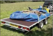  ?? Photo: Anthony Coulls ?? BELOW: The 'flat-packed' remains of Bonsall station at the time it was being removed to safe storage by the Friends.