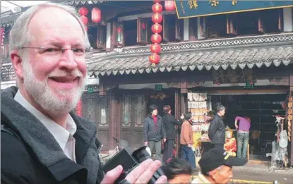  ?? PROVIDED TO CHINA DAILY ?? Bill Einreinhof­er visits Shanghai during Spring Festival in 2007.