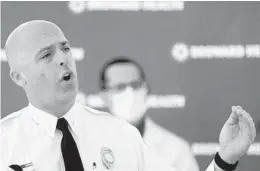  ?? AMY BETH BENNETT/SOUTH FLORIDA SUN SENTINEL ?? Fort Lauderdale Fire Rescue Battalion Chief Stephen Gollan speaks at a news conference Tuesday at Broward Health Medical Center.