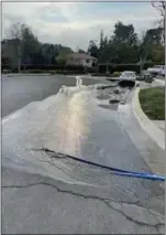  ?? COURTESY OF KENNY LARSON ?? Claremont residents are using commercial pumps to mitigate flooding in their yards, which some suspect is the product of water released from San Antonio Dam in the San Gabriel Mountains.