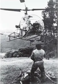  ?? PHOTO: SUPPLIED ?? ‘‘Dunc’’ flies the chopper while shooter John Duncan waits on the ground.