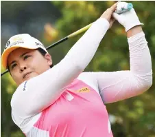  ?? — AFP photo ?? Park In-Bee plays a shot during the HSBC Women’s Champions golf tournament at the Sentosa Golf Club in Singapore in this March 3, 2017 file photo.