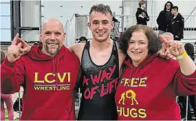  ?? JACQUELINE SCHRYER-ZAK PHOTO ?? Lindsay Collegiate and Vocational Institute student Chayton Valleau (pictured with dad/coach Shawn Valleau and LCVI vice-principal Jacqueline Schryer-Zak) recently wrapped up his high school wrestling career with a gold-medal win at OFSAA.