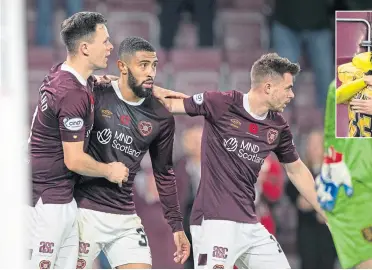  ?? ?? Josh Ginnelly adds a dramatic final twist with his 97th minute equaliser for Hearts