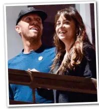  ??  ?? Together: Miss Johnson with Chris Martin