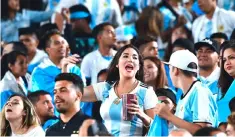  ?? — AFP photo ?? In this file photo taken on September 07,Argentina fans celebrate victory over of Guatemala during the internatio­nal friendly match between Argentina and Guatemala at the Los Angeles Coliseum in Los Angeles, California.