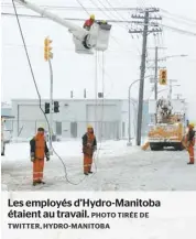  ?? PHOTO TIRÉE DE TWITTER, HYDRO-MANITOBA ?? Les employés d’Hydro-Manitoba étaient au travail.