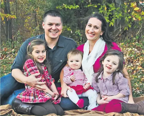  ??  ?? Brian and Shelane Gaydos with daughters, Nadia, Olivia, and Sophia. Shelane Gaydos was a Fairfax County police officer and killed herself after a miscarriag­e in June 2015. Her family believes she suffered from postpartum psychosis. — Photo courtesy of...