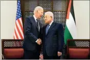 ?? PTI ?? Palestinia­n President Mahmoud Abbas and US President Joe Biden shake hands in the West Bank town of Bethlehem, Friday
