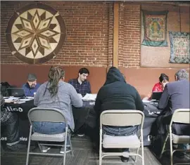  ?? Photograph­s by Jessica Q. Chen Los Angeles Times ?? SATURDAY’S Drug Policy Alliance “expungemen­t clinic” at the Amity Foundation, near downtown, was the last of the year. Another will be held there Jan. 6.