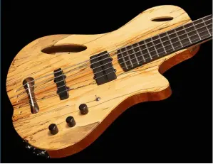  ??  ?? Alex custom-built this electric bass with an aim of capturing the sound of a double bass for its owner. Wood, craftsmans­hip and design were all key players in the build – but its final sound remained in the hands of its player