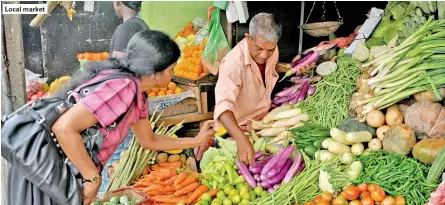  ??  ?? Local market