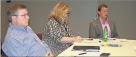  ??  ?? Assistant Floyd County Manager Gary Burkhalter (from left) and Jeanne Krueger, membership director of the Rome Floyd Chamber, listen as Ken Wright, Chamber director of business and industry services, reports on efforts to acquire the former Northwest...