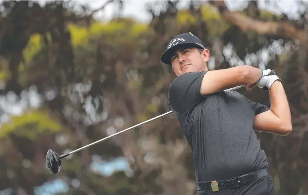  ??  ?? GREAT ROUND: Australia's Max McCardle tees off on the 2nd hole during Round 2 of the Australian Open Golf Championsh­ips at The Lakes. Picture: BRETT COSTELLo